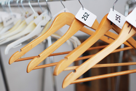 Wooden Clothes Hangers fashion. Isolated in dressing roomの写真素材