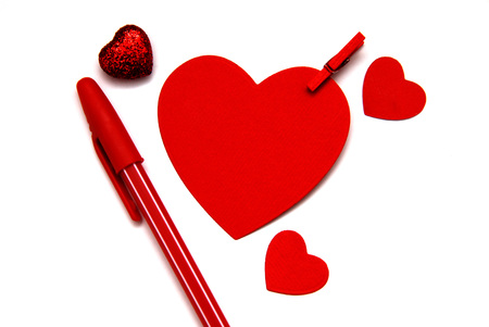 Redpaper heart with red pen for note, Valentines day background conceptの写真素材