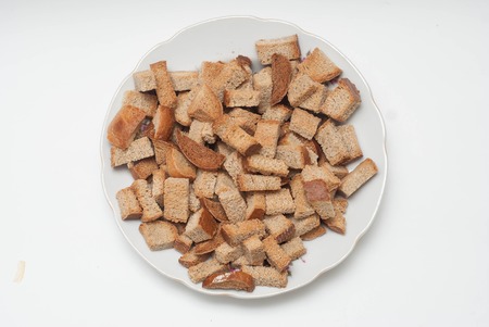 Homemade Baked Fresh Crackers in White Plate on White Background. Healthy food.の写真素材