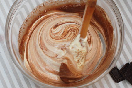 Mixing with Wooden Spoon Butter Dough in Glass Bowl. Cooking Chocolate Pie.の写真素材