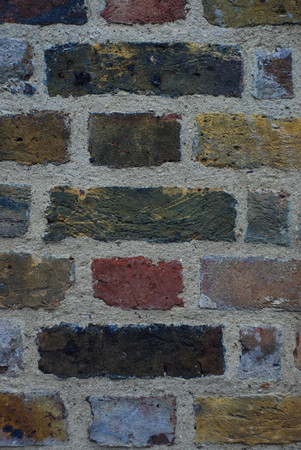 Old colored Textured Brick Wall background. Vintage effect. Vertical Image. London, 2018.の写真素材