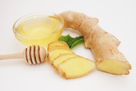 Honey, Ginger and ginger slices. Wooden Spoon for honey. healthy Ingredinetの写真素材