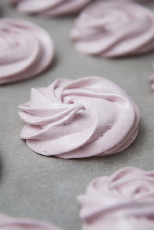 Marshmallow, Meringue, Zephyr over Baking Paper ready for Drying. Pink Dessert with Strawberry.