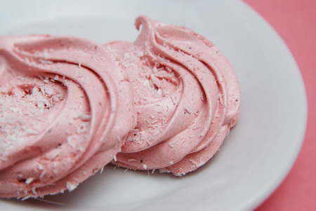 Pink Homemade Marshmallows or Zephyr. Pink Strawberry Desert over Pink Background.の写真素材