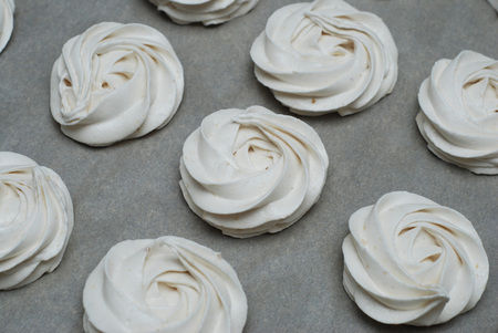 White Marshmallow, Meringue, Zephyr over Baking Paper ready for Drying.の写真素材