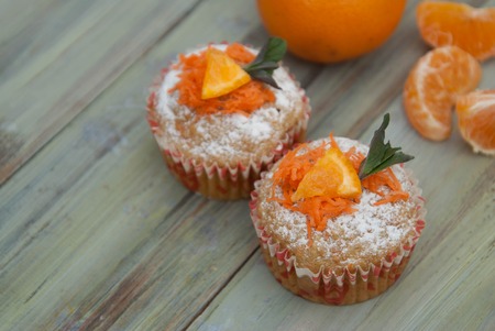 Carrot Healthy Muffins Cupcakes Buns on a WoodenRustic board. Homemade bakeryの写真素材