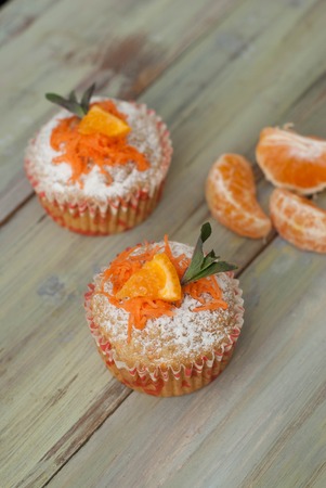 Carrot Healthy Muffins Cupcakes Buns on a WoodenRustic board. Homemade bakeryの写真素材