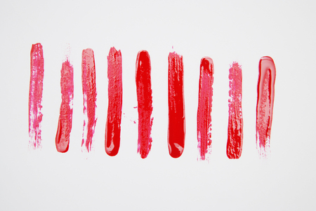 Set of cosmetic texture brush strokes isolated on white. Red Paint texture.の写真素材