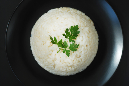 Hot Cooked Boiled White Rice on Black Background,の写真素材