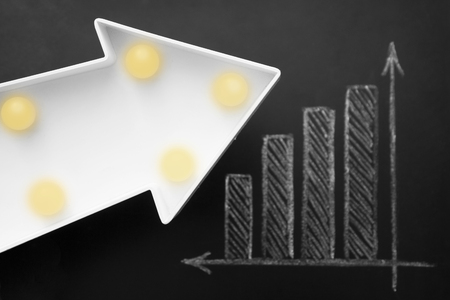 Business and growth concept. Simple diagram drawn on a chalkboard, blackboard.