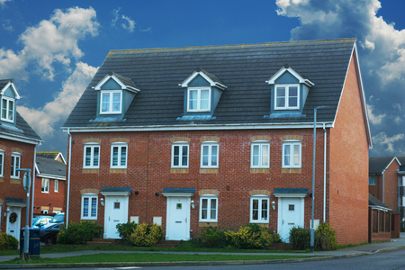 Traditional english house, brick house. Outdoor street view Corby, United Kingdomの写真素材