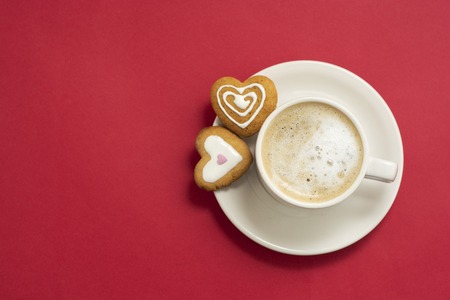 Love, Valentine's Day concept. Cup of coffee and heart shaped cookies, biscuits.の写真素材