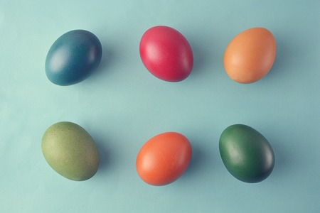 Easter eggs under the blue backgroundの写真素材