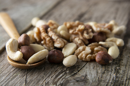 Nuts mix over wooden background. Energy super food. Proteine food. dieting, healthy food.
