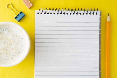 Template for social media - work space, work table. Smartphone with open notebook, coffee cup and...