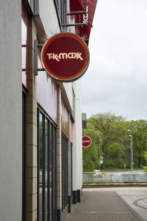 Corby, UK - 28 April, 2019 - TK Maxx sign in a shopping center, outdoor facade of storeのeditorial素材
