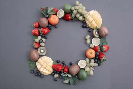 Creative layout made of summer fruits, frame.