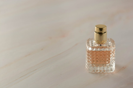 Beauty products. Perfume or parfume bottle on marble background. Copy spaceの写真素材