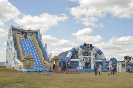 Cheltenham, united Kingdom - June 22, 2019 - Inflatable slide, playground at annual hot air balon...