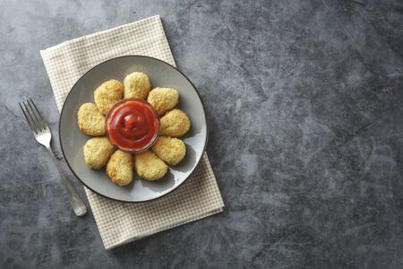 Chicken nuggets with ketchup. Fast food. Isolatedの写真素材