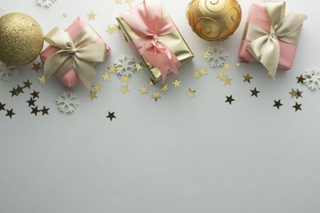 Christmas, baubles golden gift boxes party, birthday background. Celebrate shinny surprise copy...