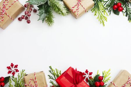 Christmas background, mock up with gift boxes and winter decoration., on white background. Winter holidays. Top view with copy space for text.の写真素材
