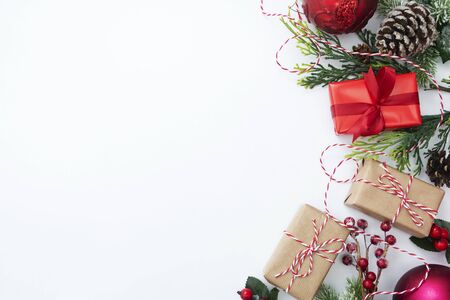 Christmas background, mock up with gift boxes and winter decoration., on white background. Winter holidays. Top view with copy space for text.の写真素材