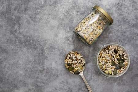 Healthy seeds mix in a glass jar, top view.の写真素材