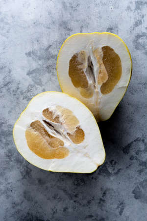 Sliced pomelo fruit isolated. Delicious citrus fruit. Healthy food.