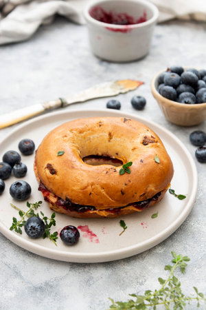 Bagels with cinnamon and blueberry, top view.の写真素材