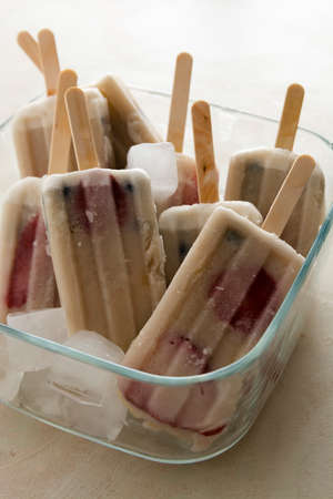 Fruit healthy berry ice cream. Homemade lolly with strawberries, blueberries and bananas.