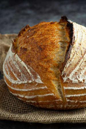 Homemade sourdough bread, rustic round loaf made with sourdogh starter wild yaestの写真素材