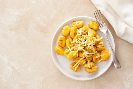 Gnocchi with cheese mediterranian food. Cooked gnocchi with butter and green herbs