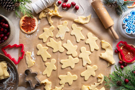 Cooking Christmas cookies. Ginger bread cookie cutter. Step by step recipe. Top view.の写真素材