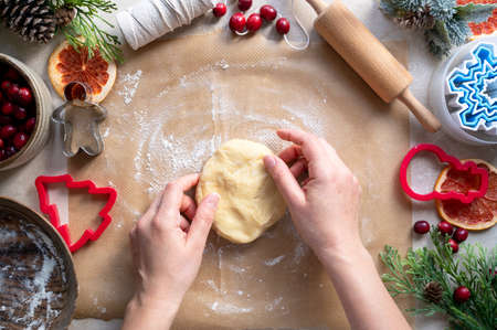 Cooking Christmas cookies. Snowflake cookie cutter. Step by step recipe. Top view.