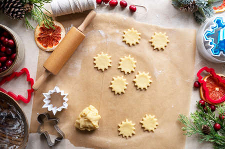 Cooking Christmas cookies. Snowflake cookie cutter. Step by step recipe. Top view.の写真素材