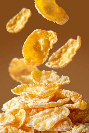 Corn flakes macro, levitation, closeup cereals for breakfast