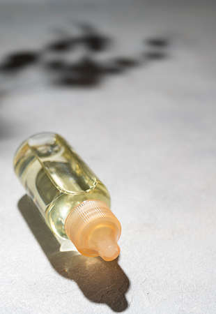 Dropper bottle with cosmetic skin care oil. Body treatment and spa. Natural beauty products. Eco...
