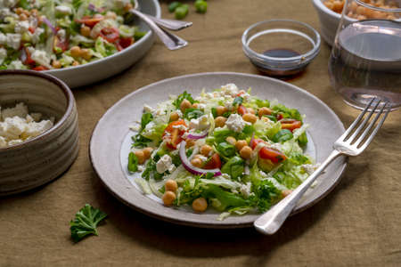 Cabbage green salad. Healthy fresh salad with tomatoes, parsley, onions, salad cheese, chickpeas. Detox, healthy foodsの写真素材