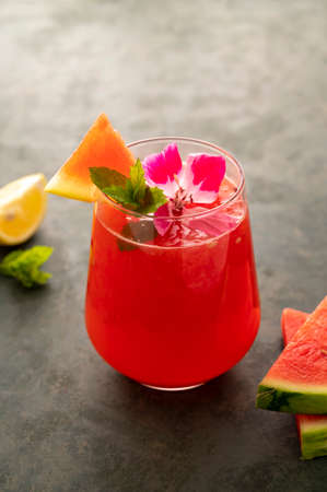 Watermelon drink, juice, lemonade with lemon and fresh mint leaves. Refreshing summer drink. Detox...
