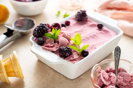 Homemade pink healthy sorbet with banana and berry ice cream summer refresing treatsの写真素材