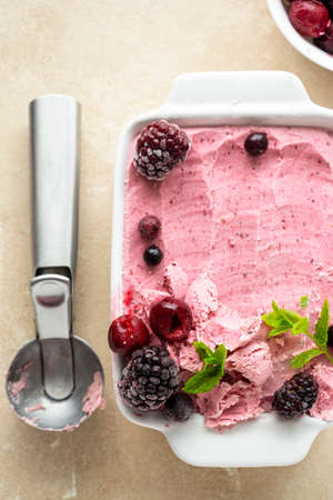 Homemade pink healthy sorbet with banana and berry ice cream summer refresing treats