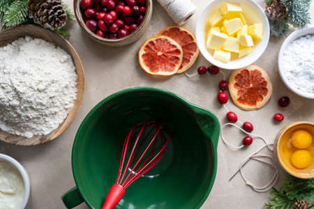 Cooking Christmas cookies. Top view of empty bowl and baking ingredients eggs, flour, butterの写真素材