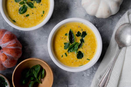 Pumpkin soup made from fresh orange butternut with coconut milk. Delicious vegan, seasonal autumn foodsの写真素材
