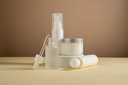 White cosmetics jars and bottles. Beauty concept, neutral backgroundの写真素材