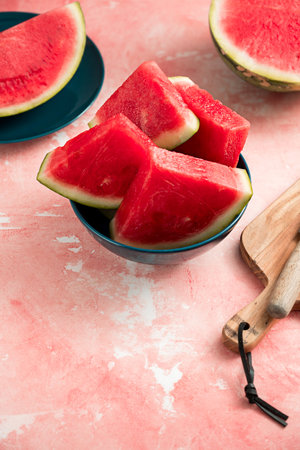 Slices of fresh watermelon fruit in a bowl, copy spaceの写真素材