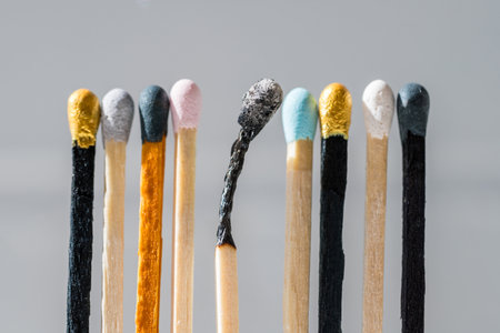 Group of colourful matches and one burned match. Diversity, inclusion abstract conceptの写真素材