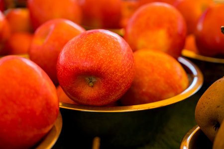Fresh red and yellow apples, outdoor fruit farm marketの写真素材
