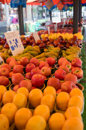 Fresh red apples, outdoor fruit farm marketの写真素材