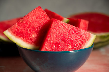 Slices of fresh watermelon in a bowlの写真素材